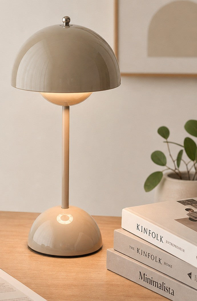 Bóveda Dome Cordless Table Lamp in white on a desk