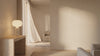 Cordless Las Noche lamp glowing in a warm Australian interior at dusk